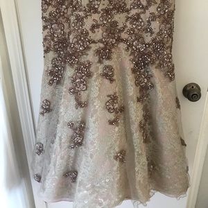 Ivonne D by Mon Cheri gown . Size 12 .